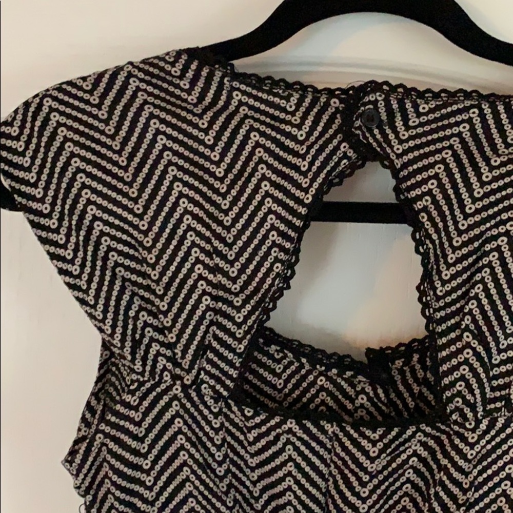 Forever 21 Black cap-sleeve romper.